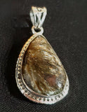 Canadian Staurolite And Garnet Pendant (in .925 Sterling Silver)