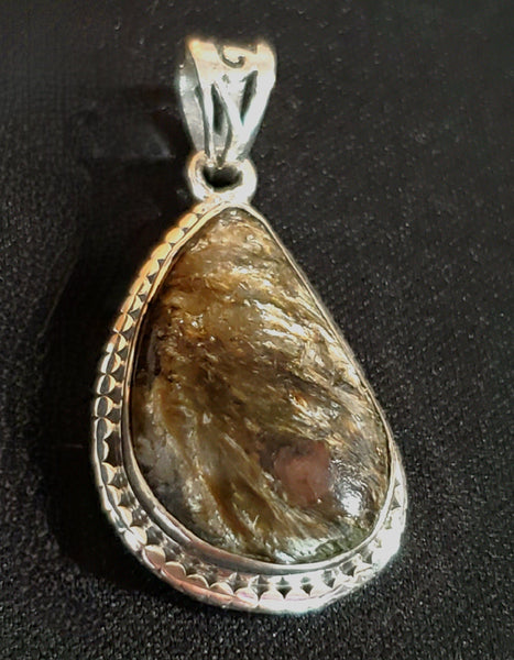 Canadian Staurolite And Garnet Pendant (in .925 Sterling Silver)