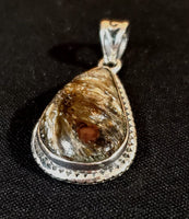 Canadian Staurolite And Garnet Pendant (in .925 Sterling Silver)