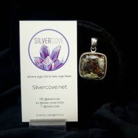 Canadian Staurolite And Garnet Pendant (in .925 Sterling Silver)