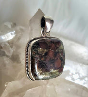 Canadian Staurolite And Garnet Pendant (in .925 Sterling Silver)