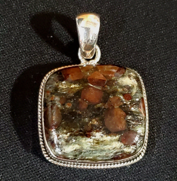 Canadian Staurolite And Garnet Pendant (in .925 Sterling Silver)