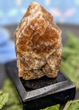 Brown Onyx On Wooden Base