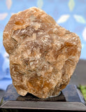 Brown Onyx On Wooden Base