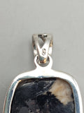 Canadian Staurolite And Garnet Pendant Set in .925 Sterling Silver
