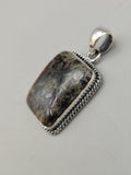 Canadian Staurolite And Garnet Pendant Set in .925 Sterling Silver