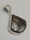 Canadian Staurolite And Garnet Pendant Set in .925 Sterling Silver