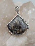 Canadian Staurolite And Garnet Pendant Set in .925 Sterling Silver