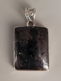 Canadian Staurolite And Garnet Pendant Set in .925 Sterling Silver
