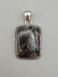 Canadian Staurolite And Garnet Pendant Set in .925 Sterling Silver