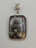 Canadian Staurolite And Garnet Pendant Set in .925 Sterling Silver