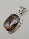 Canadian Staurolite And Garnet Pendant Set in .925 Sterling Silver