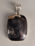 Canadian Staurolite And Garnet Pendant Set in .925 Sterling Silver