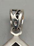 Canadian Staurolite And Garnet Pendant Set in .925 Sterling Silver