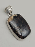 Canadian Staurolite And Garnet Pendant Set in .925 Sterling Silver