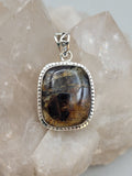 Canadian Staurolite And Garnet Pendant Set in .925 Sterling Silver