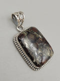 Canadian Staurolite And Garnet Pendant Set in .925 Sterling Silver
