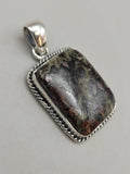 Canadian Staurolite And Garnet Pendant Set in .925 Sterling Silver