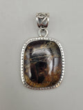 Canadian Staurolite And Garnet Pendant Set in .925 Sterling Silver