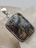 Canadian Staurolite And Garnet Pendant Set in .925 Sterling Silver