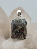 Canadian Staurolite And Garnet Pendant Set in .925 Sterling Silver
