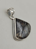 Canadian Staurolite And Garnet Pendant Set in .925 Sterling Silver