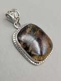 Canadian Staurolite And Garnet Pendant Set in .925 Sterling Silver
