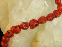 Red Magnesite Skull Bead Strand (Dyed)