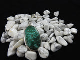 Chrysocolla pendant set in Sterling Silver