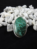 Chrysocolla pendant set in Sterling Silver