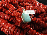 Sterling Silver pendant with a Larimar stone on red backdrop