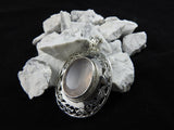 Rose Quartz in sterling silver pendant close up
