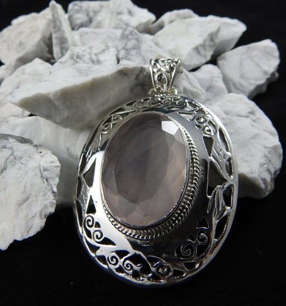 Rose Quartz in sterling silver pendant close up