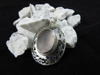 Rose Quartz in sterling silver pendant close up