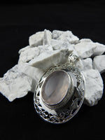 Rose Quartz in sterling silver pendant close up