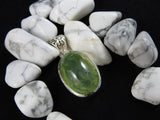 Prehnite stone on Howlite