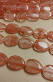 Cherry Quartz Flat Teardrop Bead Strand