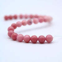 Coral Colored Bead Strands