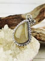 Curved Teardrop Rutilated Quartz Pendant