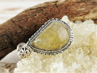 Curved Teardrop Rutilated Quartz Pendant