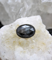 Eye of Odin Silver Sheen Sapphire Cabochon (Faceted)