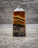 Brown Onyx Tower Carving, 158g