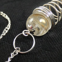 Clear Quartz Sphere and Terminated Point Pendulum