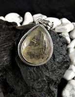 Faceted Rutilated Quartz in Sterling Silver Pendant