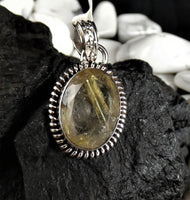 Faceted Rutilated Quartz in Sterling Silver Pendant