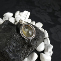 Faceted Rutilated Quartz in Sterling Silver Pendant
