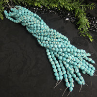 Blue Magnesite Skull Bead Strands