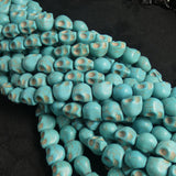 Blue Magnesite Skull Bead Strands