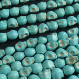 Blue Magnesite Skull Bead Strands