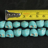 Blue Magnesite Skull Bead Strands